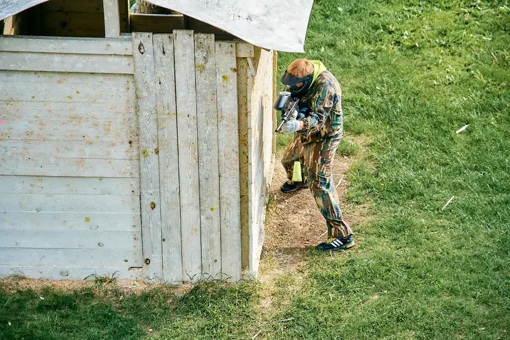 Player perspective lining up a crucial shot in a tactical shooter