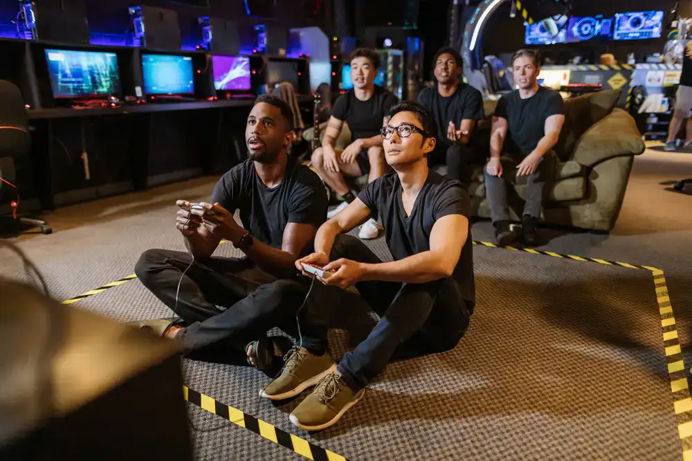 Esports competitors focusing on their screens during a tournament