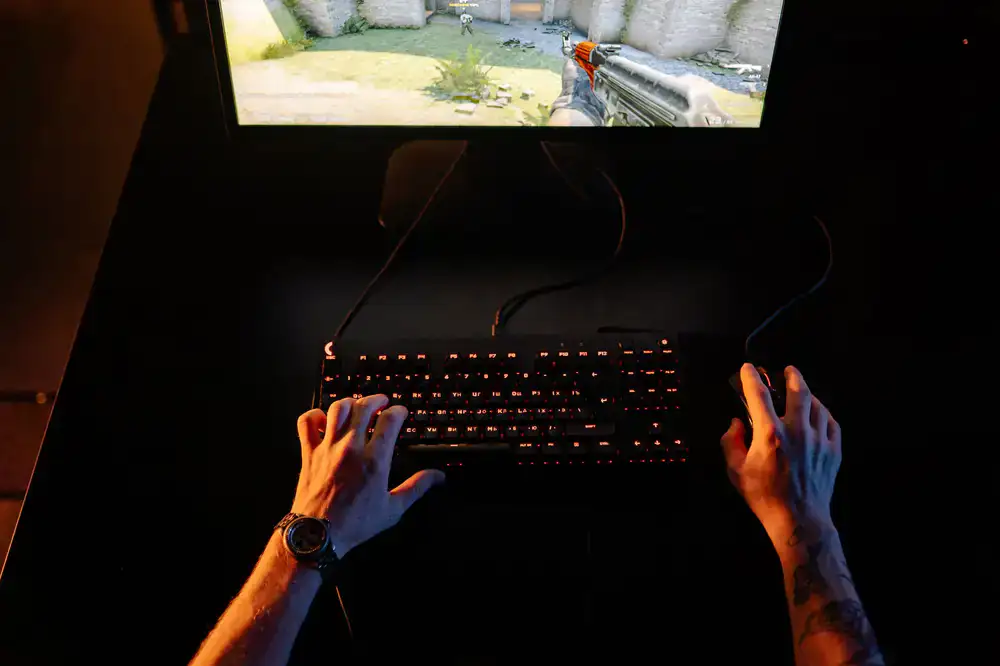 First person shooter gameplay screen on tournament monitors